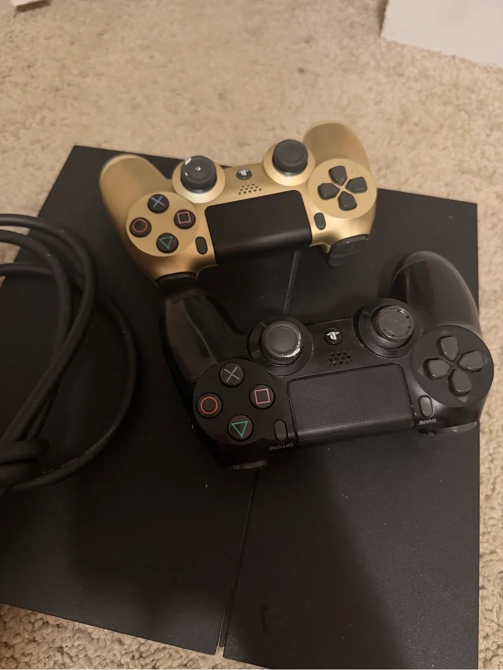 Sony PlayStation 4 Slim Console with Black and Gold DualShock Controllers